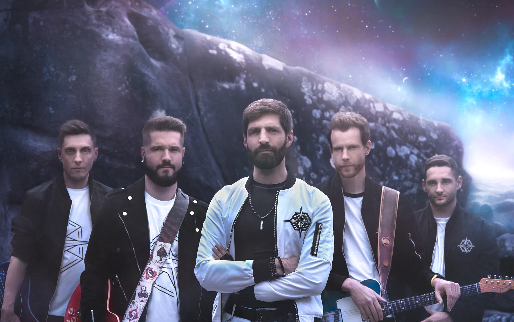 The five members of The Redshift Empire in front of a rock face under a starry sky